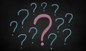 Wiele znaków zapytania na czarnym tle. Czy to symbolizuje upadłość konsumencką bez majątku i niepewność jutra?