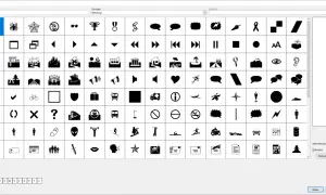 Wybór znaków specjalnych, w tym symbol paragrafu, z czcionki Webdings.