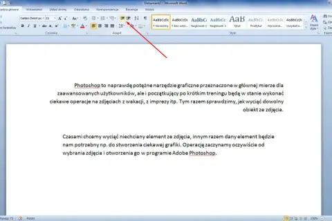 Jak zrobić akapit w Wordzie? Wskazówka z czerwonej strzałki pokazuje opcje formatowania akapitu.