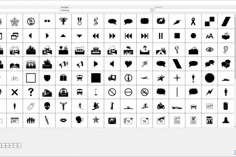 Wybór znaków specjalnych, w tym symbol paragrafu, z czcionki Webdings.