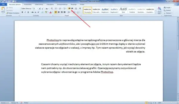 Jak zrobić akapit w Wordzie? Wskazówka z czerwonej strzałki pokazuje opcje formatowania akapitu.