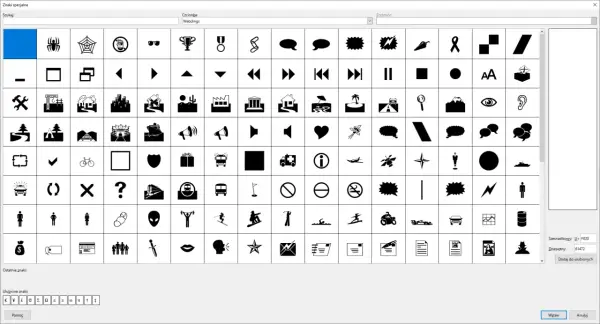 Wybór znaków specjalnych, w tym symbol paragrafu, z czcionki Webdings.
